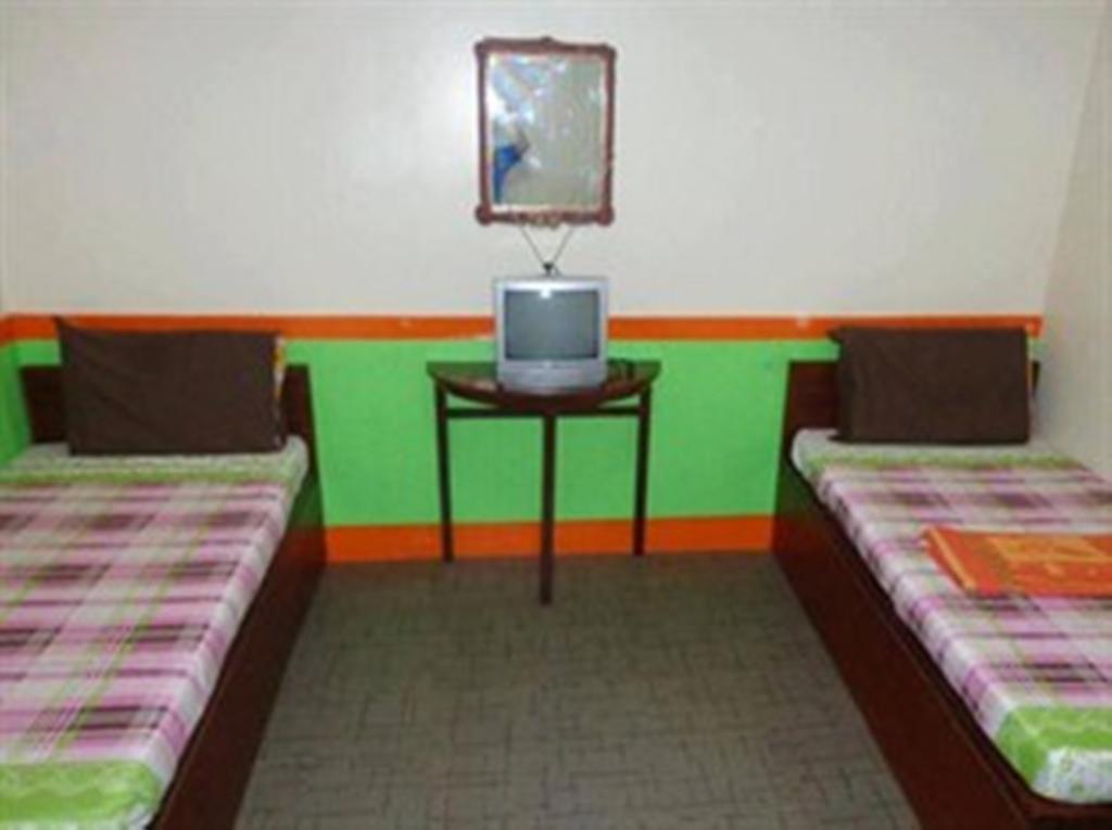 קאליבו Np Festival Inn חדר תמונה